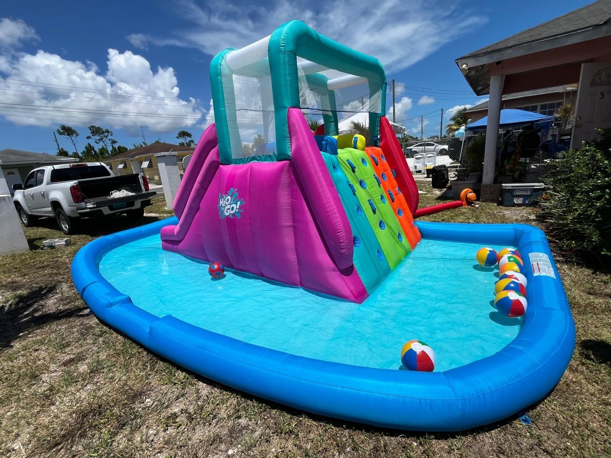 Water Slide Bouncing Castle Rental – Splash & Jump Fun for Kids’ Parties - Savoury Luxury Events